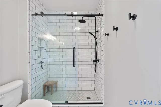 a view of a balcony with potted plants