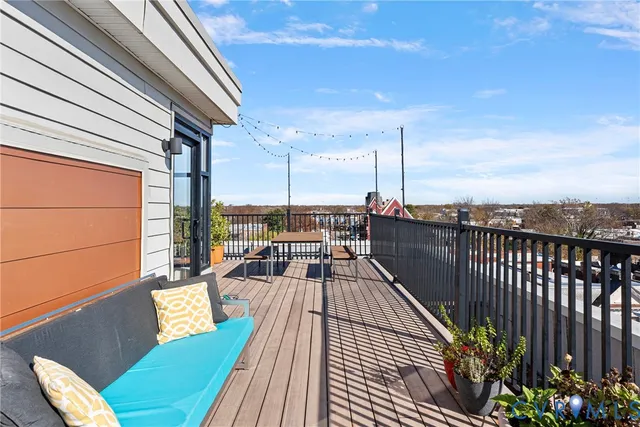 a view of a terrace with city view