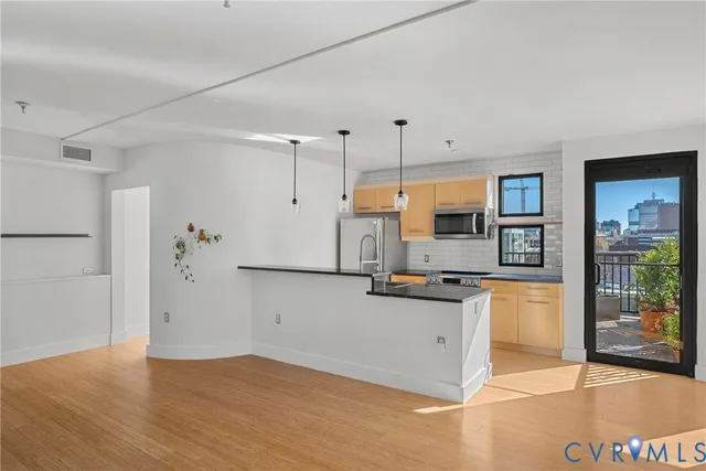 a view of livingroom with furniture and wooden floor