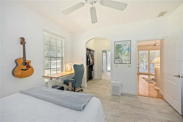 a view of a livingroom with furniture and windows