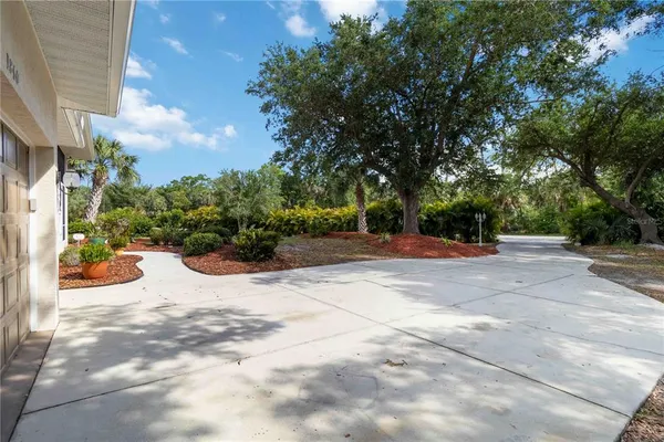 a view of backyard with green space