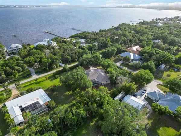 an aerial view of residential house with outdoor space and street view