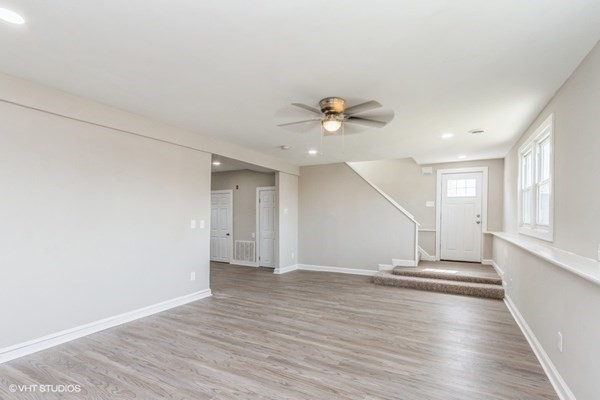 170-180 America Street Fall River, MA 02721 - Photo 22 of 40 wooden floor in an empty room with a window