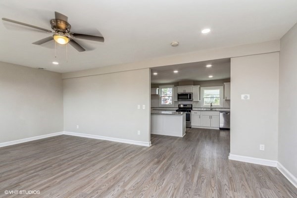 170-180 America Street Fall River, MA 02721 - Photo 24 of 40 a view of kitchen with refrigerator microwave and stove
