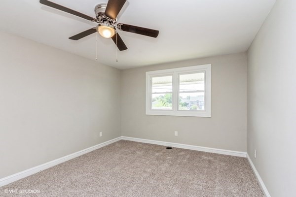 170-180 America Street Fall River, MA 02721 - Photo 36 of 40 an empty room with a window and a fan