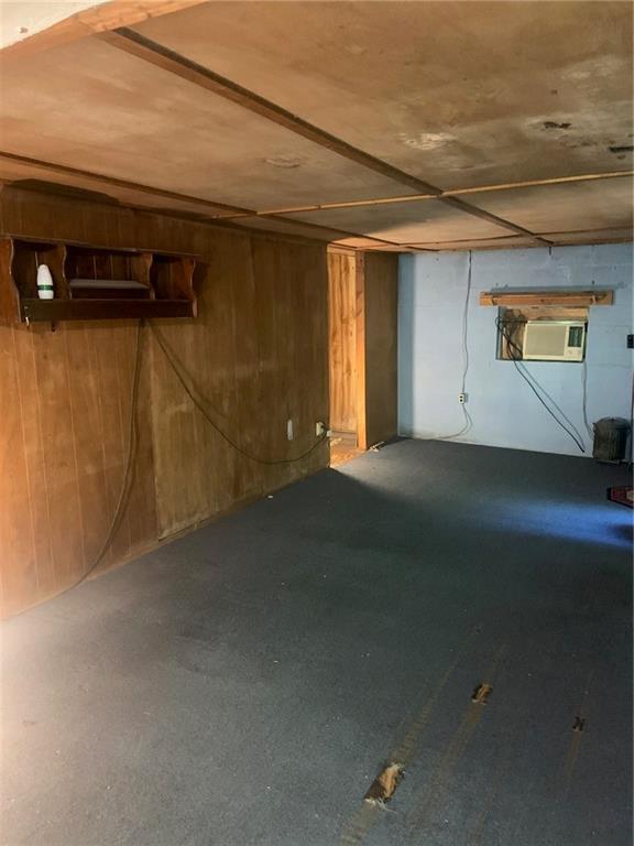 222 Chipmunk Road Evans City, PA 16033 - Photo 12 of 33 a view of a livingroom with an empty space and a window