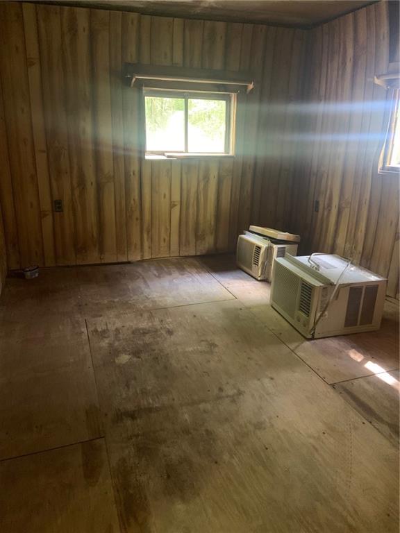 222 Chipmunk Road Evans City, PA 16033 - Photo 8 of 33 a view of a room with brick walls and windows