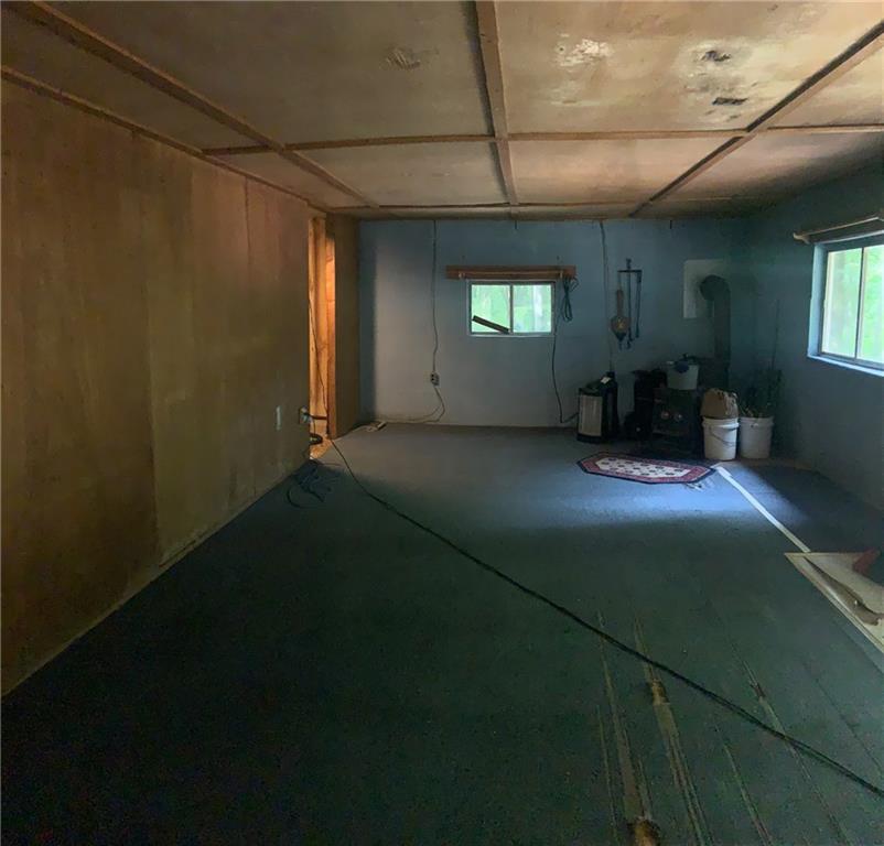 222 Chipmunk Road Evans City, PA 16033 - Photo 10 of 33 a view of an empty room and window