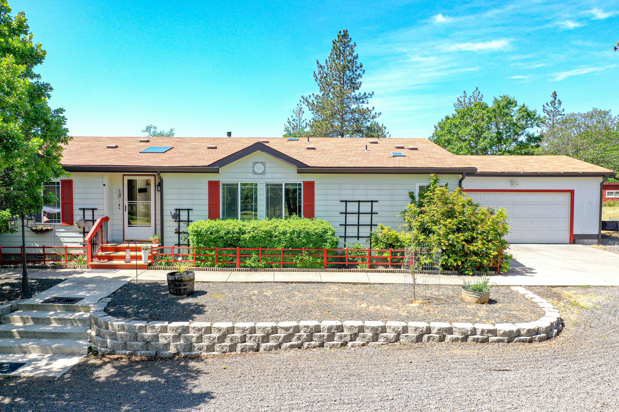 6297 Dodge Road White City, OR 97503 - Photo 6 of 45 a front view of a house with a yard