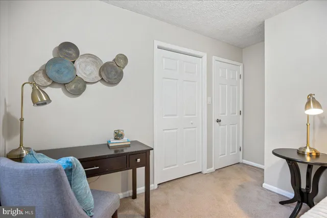 a view of a livingroom with furniture
