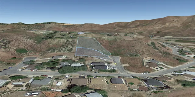 a view of a house with a mountain