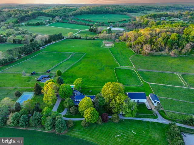 a view of a lake with a yard