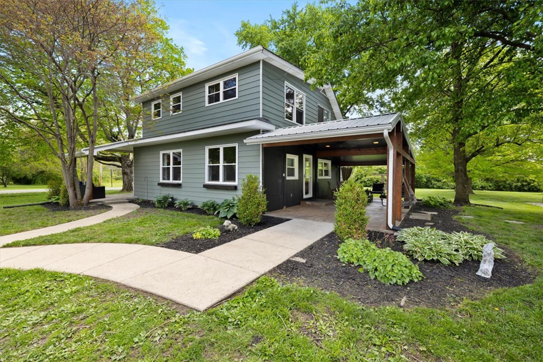 5120 Wheelock Road Troy, OH 45373 - Photo 45 of 67 This charming home offers a welcoming facade with a covered patio for outdoor enjoyment.