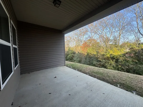 a view of a room with a large window