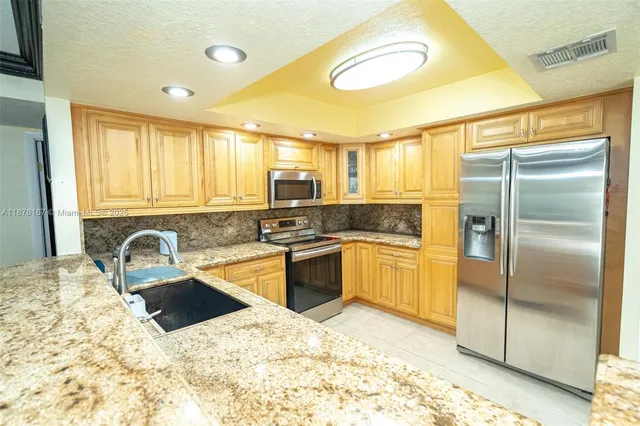 a view of a hallway with windows