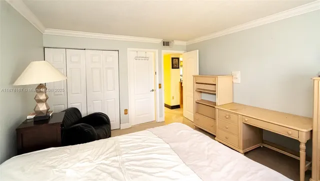 a bathroom with a sink a mirror and a shower