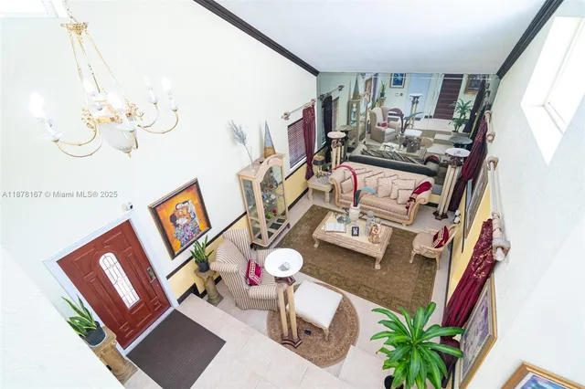 a kitchen with stainless steel appliances a refrigerator and a stove top oven