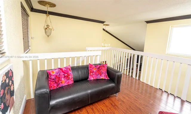 a view of a park with palm trees