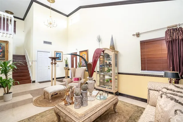 a view of a room with a wooden floor