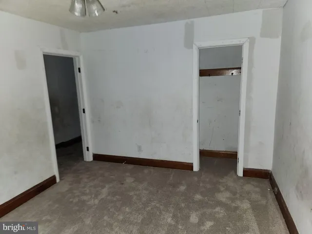 an empty room with closet