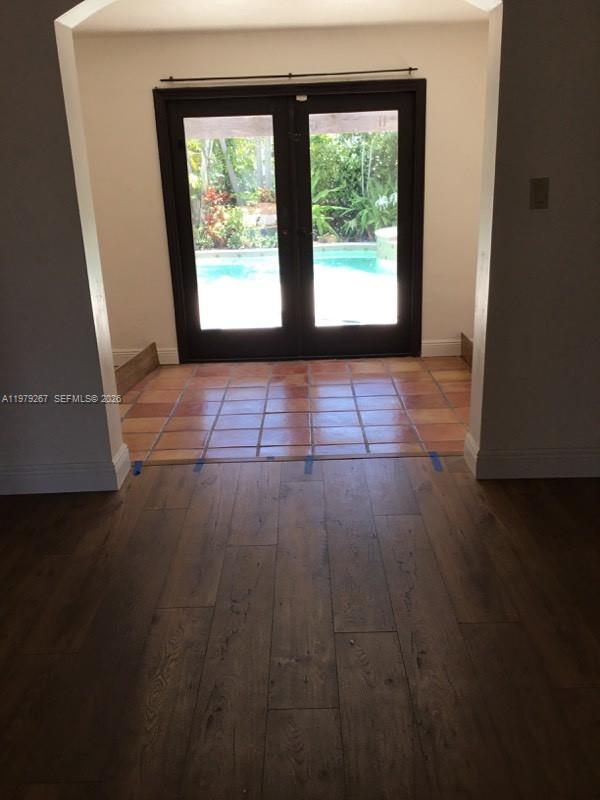 8927 Hawthorne Avenue Surfside, FL 33154 - Photo 12 of 40 a view of an empty room with a window