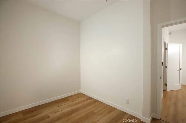 a view of a patio with wooden floor