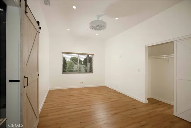 a outdoor living space with furniture and city view
