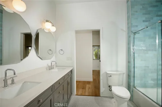 a view of a chairs and table in patio