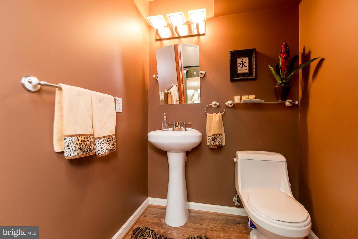 9618 Brie Road Randallstown, MD 21133 - Photo 23 of 30 Powder Room in Lower Level w/ TV