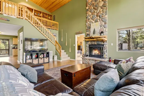 a view of front door with wooden door