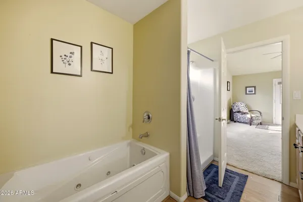 a view of a house with a door and wooden floor