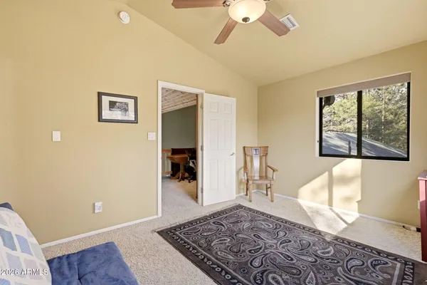 a view of a book shelf with lots of books