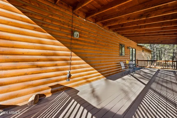 a bedroom with bed and a couch