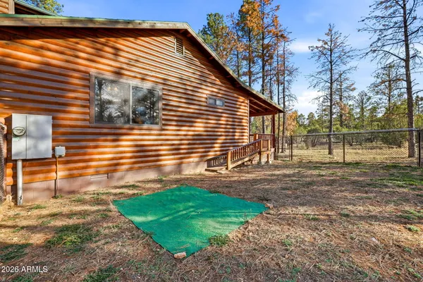 a view of balcony with wooden floor