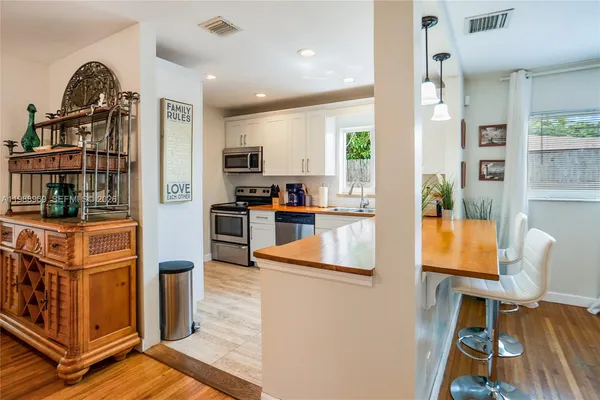 a bedroom with a bed and a chair