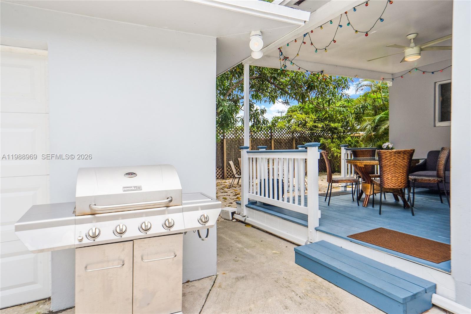 113 Southwest 2nd Street Hallandale Beach, FL 33009 - Photo 16 of 50 a view of a dining room with furniture window and outside view