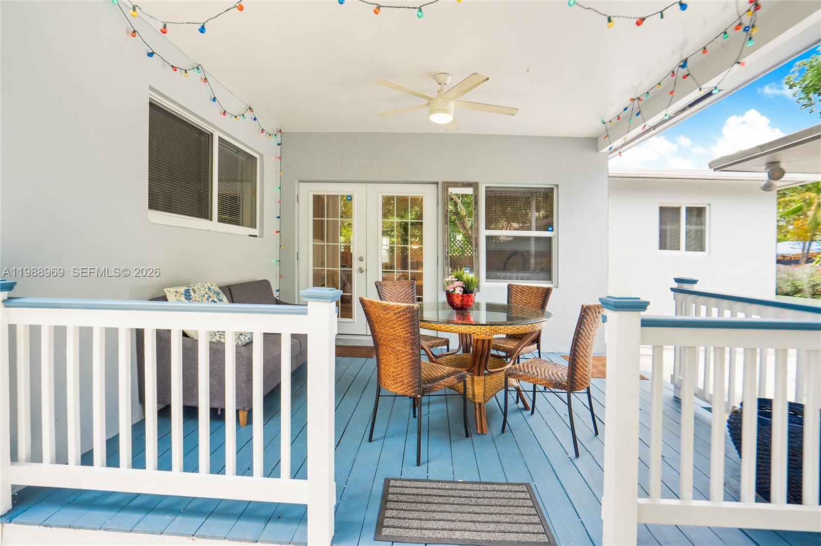 113 Southwest 2nd Street Hallandale Beach, FL 33009 - Photo 2 of 50 a view of a dining room with furniture window and wooden floor