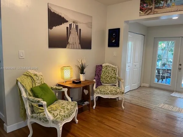 a kitchen with a refrigerator and a stove