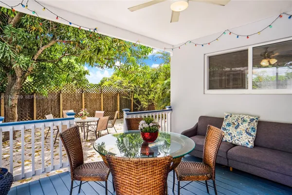 a outdoor living space with furniture and a potted plant