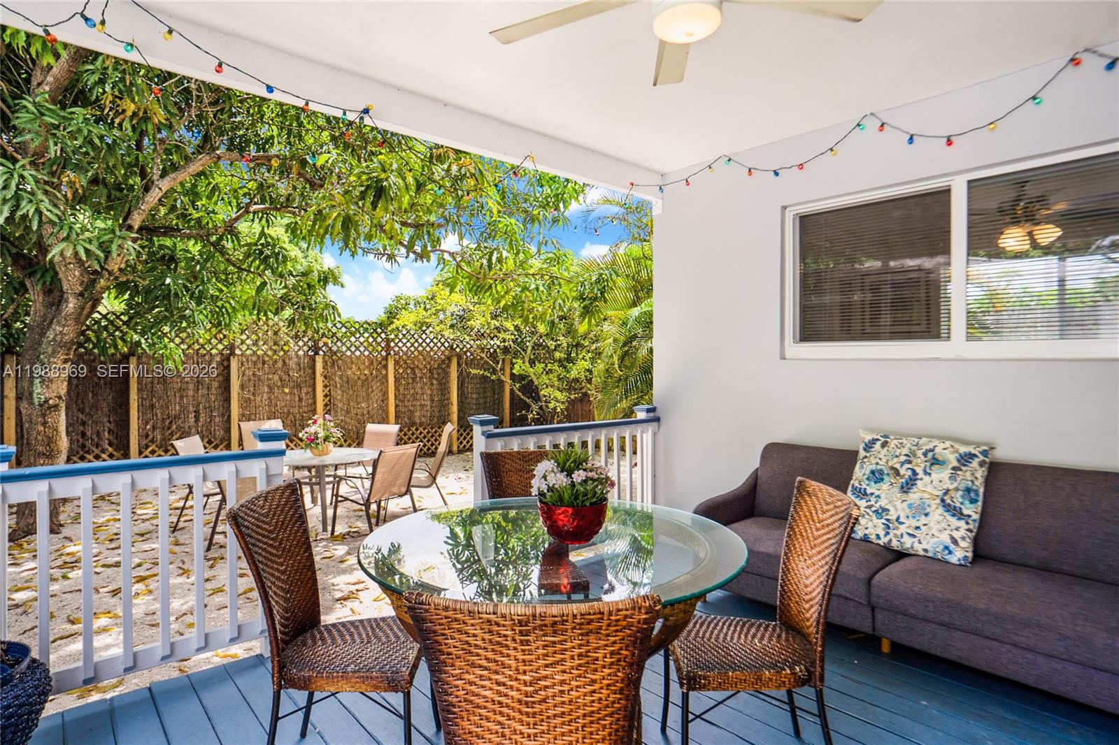 113 Southwest 2nd Street Hallandale Beach, FL 33009 - Photo 3 of 50 a outdoor living space with furniture and a potted plant