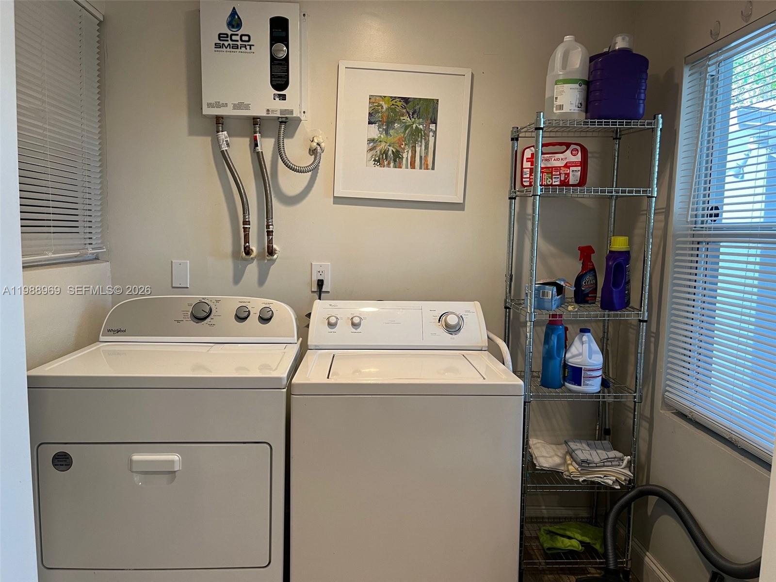 113 Southwest 2nd Street Hallandale Beach, FL 33009 - Photo 33 of 50 a utility room with dryer and washer