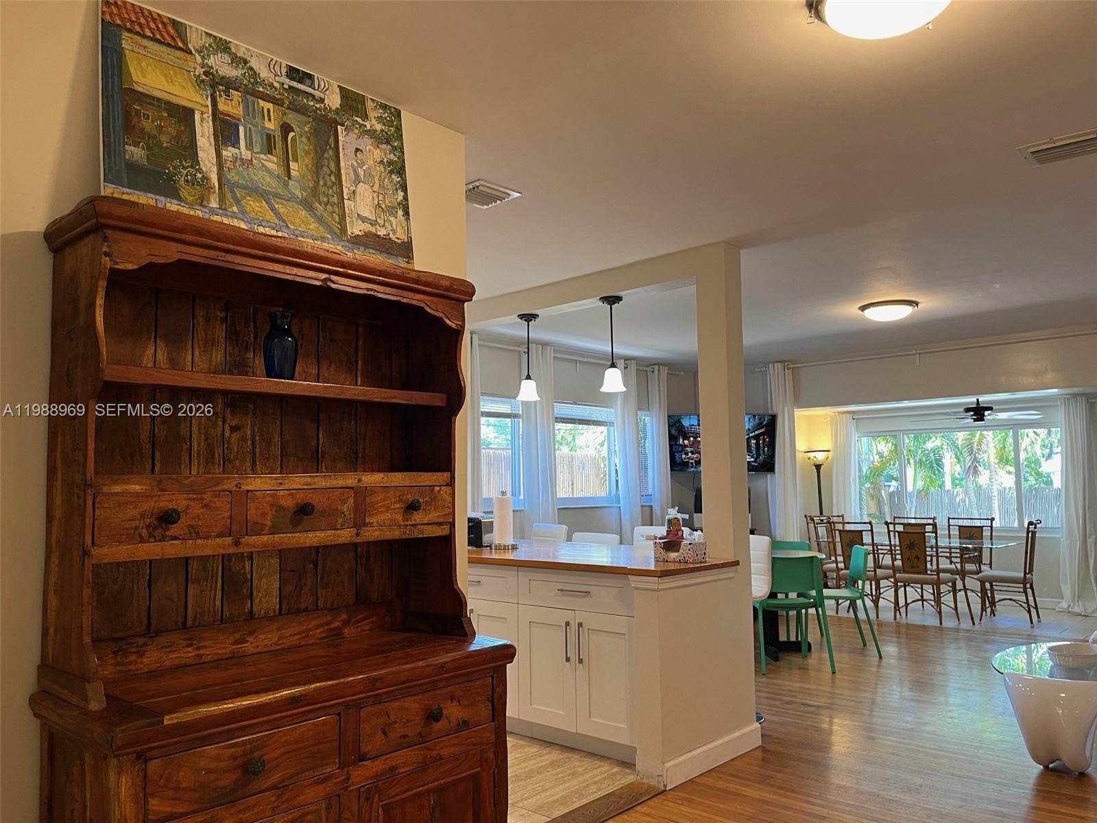 113 Southwest 2nd Street Hallandale Beach, FL 33009 - Photo 35 of 50 a kitchen with a refrigerator and a stove