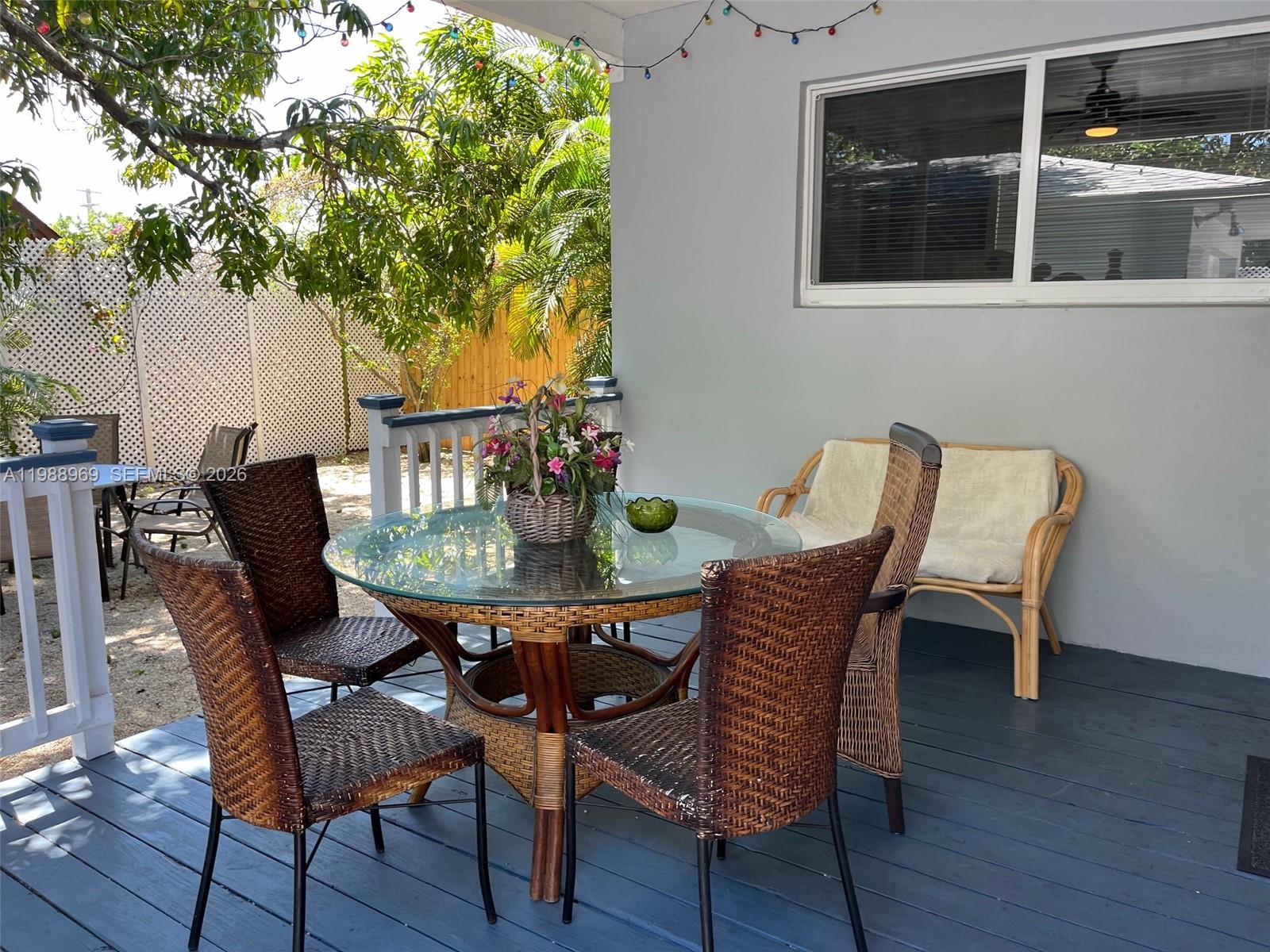 113 Southwest 2nd Street Hallandale Beach, FL 33009 - Photo 38 of 50 a view of a outdoor seating area with furniture