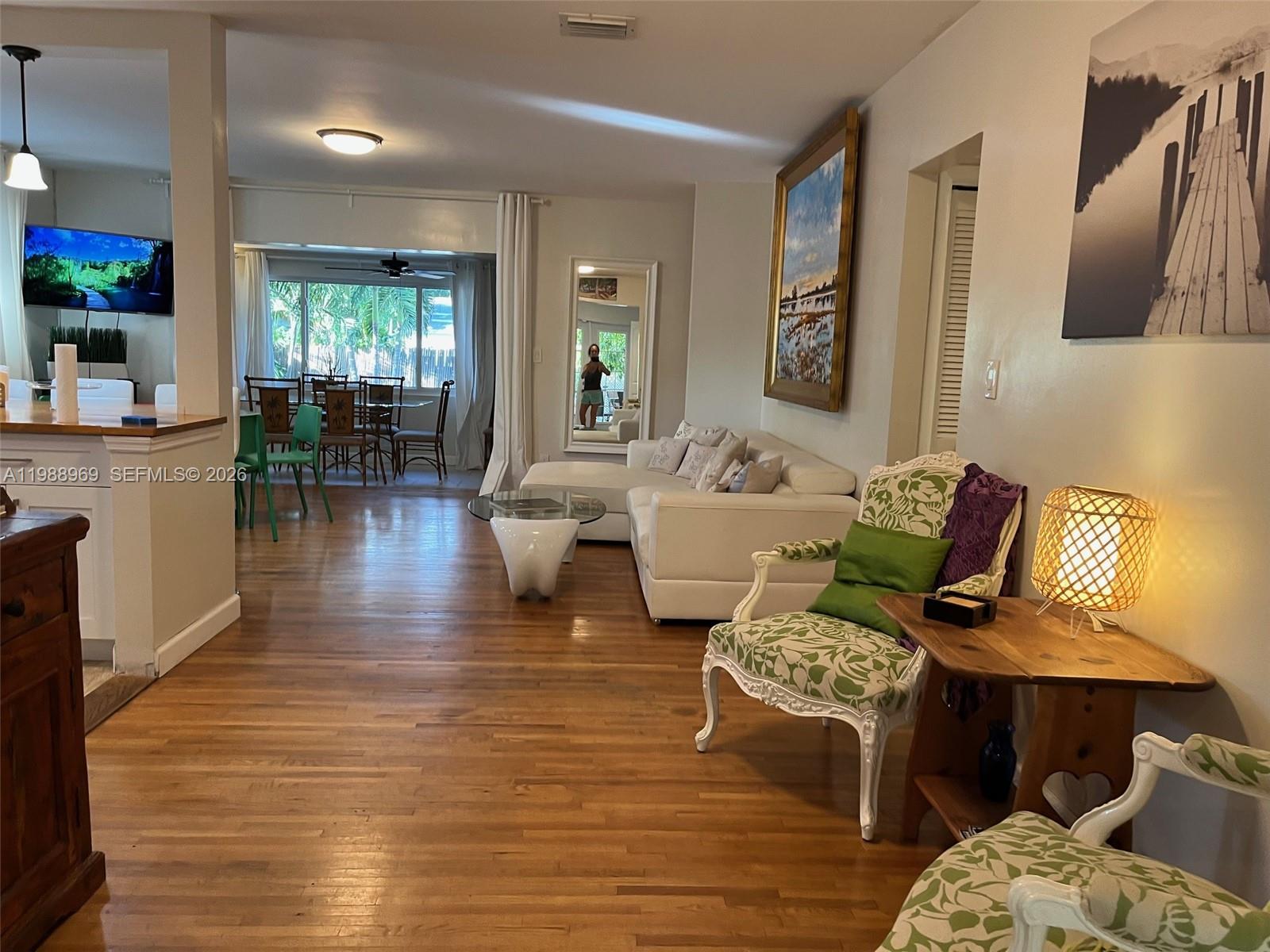 113 Southwest 2nd Street Hallandale Beach, FL 33009 - Photo 42 of 50 a living room with furniture and wooden floor