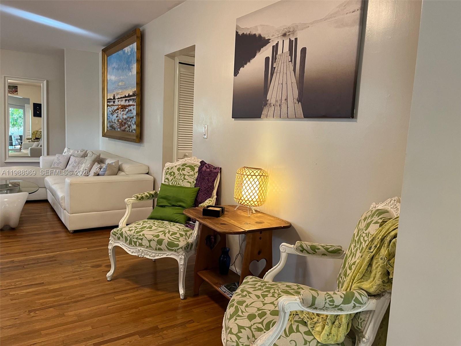 113 Southwest 2nd Street Hallandale Beach, FL 33009 - Photo 43 of 50 a living room with furniture and wooden floor