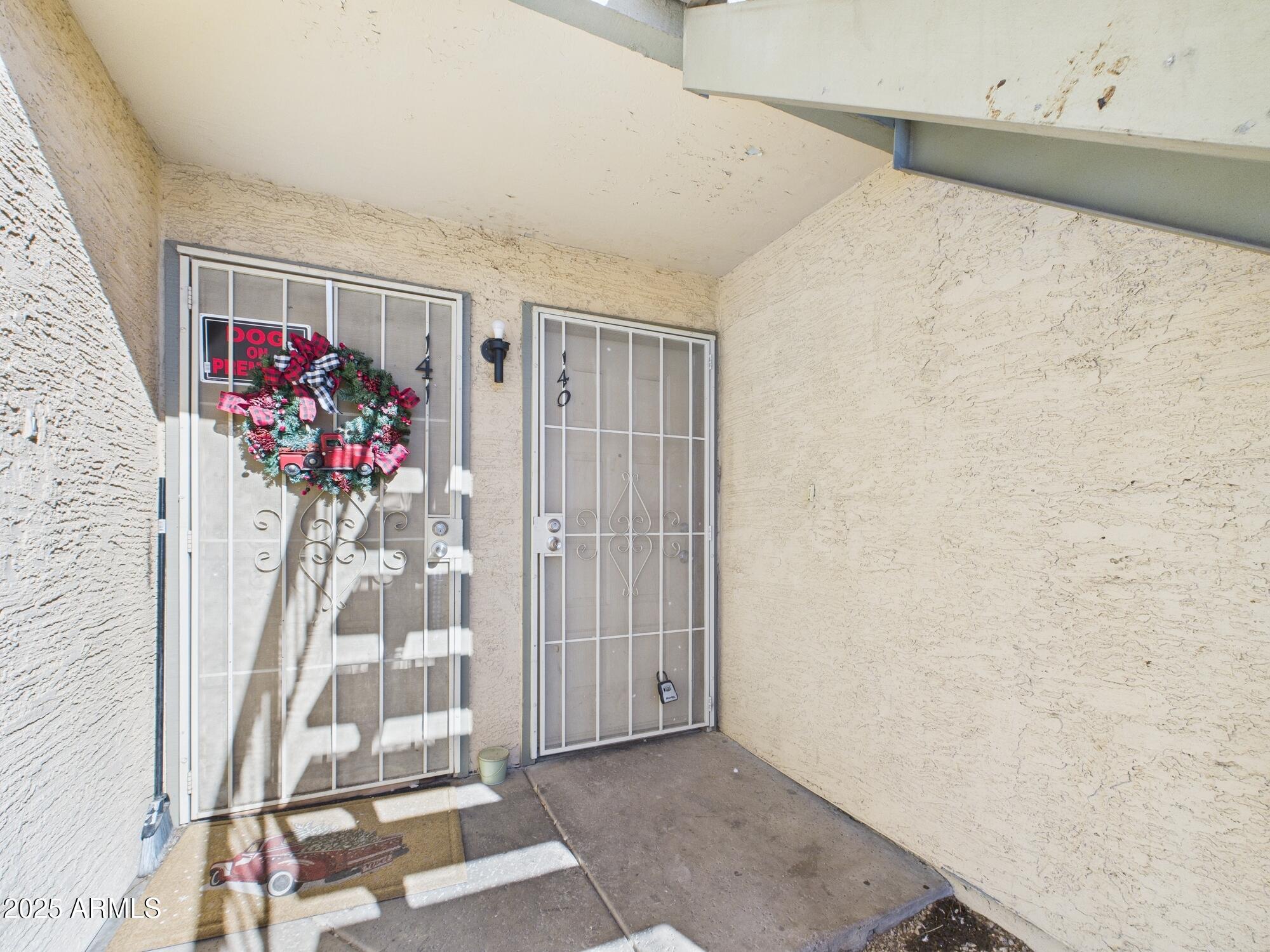 5236 West Peoria Avenue, Unit 140 Glendale, AZ 85302 - Photo 2 of 11 a view of entryway with wooden floor