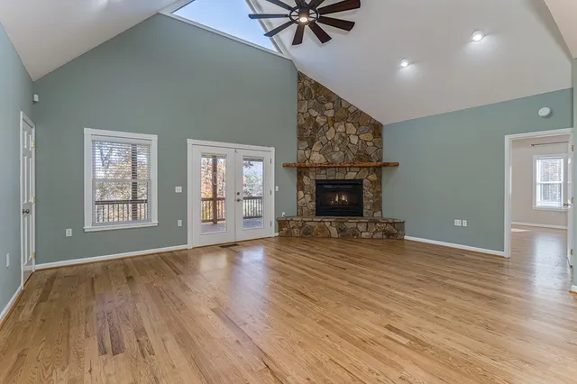 a view of a balcony with wooden floor