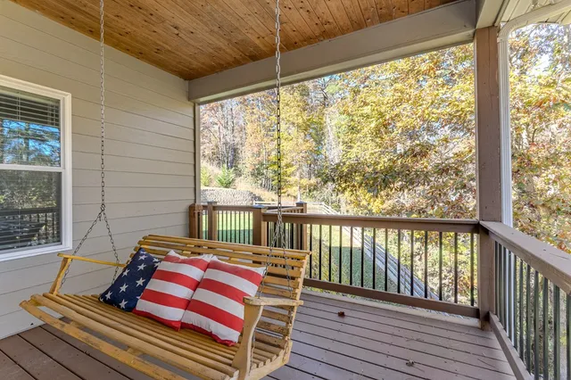 a spacious bathroom with a double vanity sink a toilet and a mirror