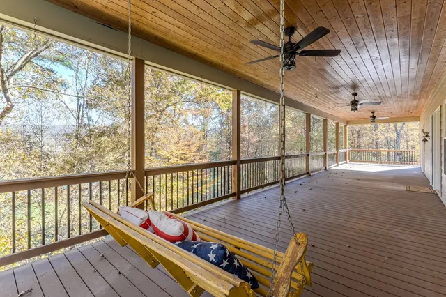 a bathroom with a tub and a sink