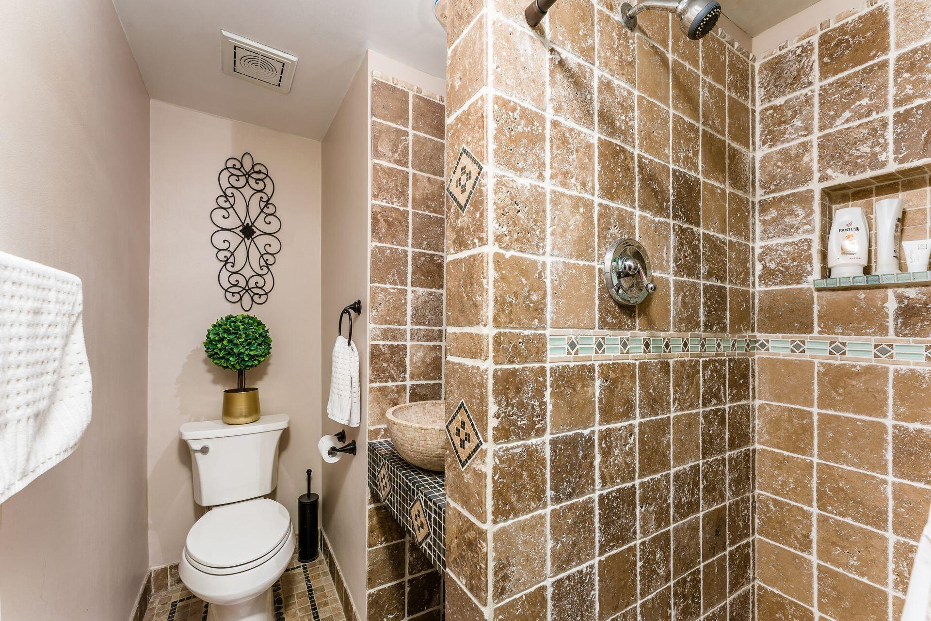 7080 Rieber Street Columbus, OH 43085 - Photo 37 of 55 Full Bathroom in basement with nice tilework!